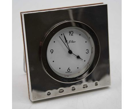 An Elizabeth II Carrs silver mounted mantel clock, h.10.5cm