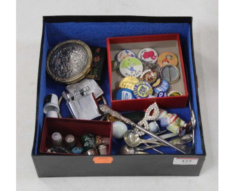 A collection of miscellaneous items, to include a pocket knife, button hook, pocket cigarette lighters, thimbles, badges etc 