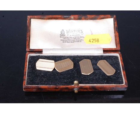 A cased pair of gent's 9ct gold engine turned cufflinks, 3.6g