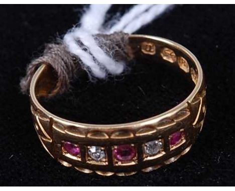 A late Victorian 18ct gold, ruby and diamond set half eternity ring, 2.6g, assayed London 1887, size JCondition report: No si