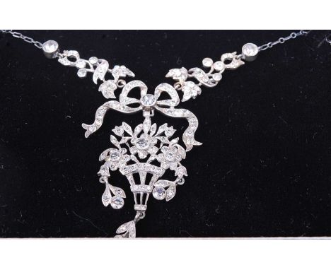 A mid-Victorian white metal and paste set necklet, arranged as a posy holder issuing flowers and foliage, with ribbon surmoun