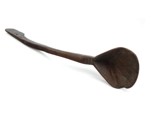 Treen: a large tribal style carved wooden ladle or scoop - possibly Swat Valley, Pakistan, with distinctive V-shaped bowl and