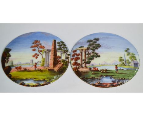 A pair of George III enamel circular picture plaques, probably Bilston or London, painted in polychrome with shepherds and th