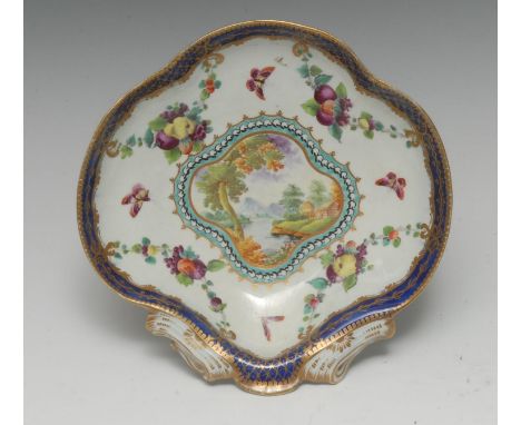 A Worcester Dalhousie style shell dish, decorated with a central cartouche painted with a landscape, edged with a pattern of 