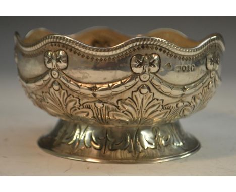 A Victorian silver sugar bowl, undulating lip, embossed ribbon bow swag above foliate body and foot, Martin, Hall &amp; Co. L