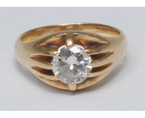 An impressive Gentleman's diamond and yellow metal signet ring, large single round brilliant cut diamond measuring approx 8.2