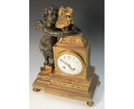 A 19th century French ormolu and bronze mantel clock, the 10cm enamelled dial with Arabic numeral with floral swags, twin win