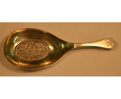 A German silver filigree caddy spoon, 9.5cm long, 18th/early 19th century