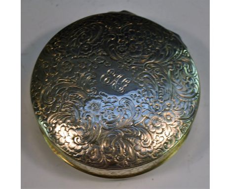 A large early Victorian silver circular table snuff box, engraved overall with flowers and scrolling foliage, gilt interior, 