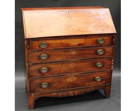 A George III mahogany bureau, fall front enclosing a fitted interior above four long graduated cockbeaded drawers, brass oval