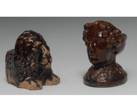 A 19th century Staffordshire treacle glazed sash window supports, as a curly haired gentleman, 12.5cm high, c.1850; another, 