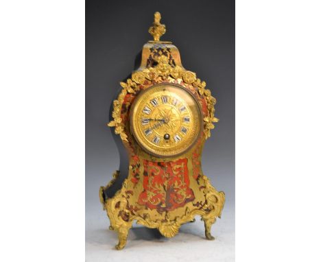 A 19th century French gilt metal mounted boulle work cartouche shaped mantel timepiece, 9cm clock dial inscribed upon enamel 