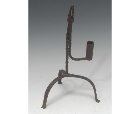 An 18th century wrought iron nip rush light holder, candlestick socket, downswept tripod base, 27cm high
