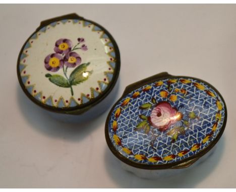 A George III South Staffordshire enamel oval patch box, the hinged cover painted with a pink rose on a blue trellis ground wi