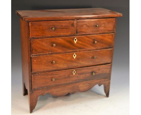 A George III mahogany miniature chest of drawers, oversailing top above two short and three long graduated drawers, shaped ap