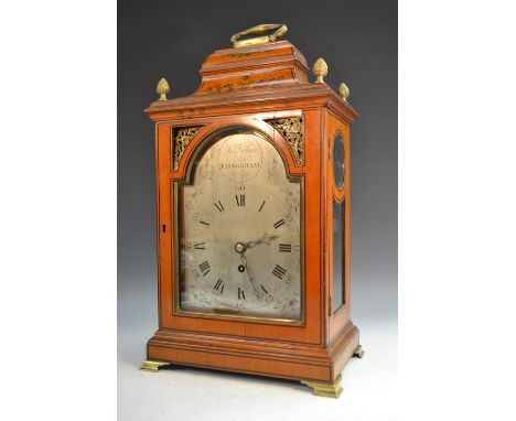 A George III painted satinwood bracket timepiece, 17cm arched silvered dial inscribed Jno. Vidion, Faversham, Roman and subsi