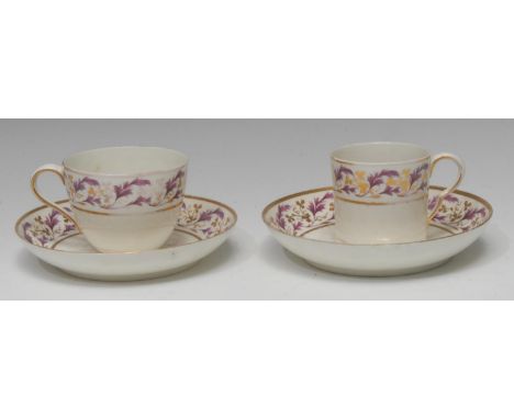 A Pinxton coffee can, Bute shape tea cup and two saucers, pattern No. 275, decorated in puce and gilt with bands of scrolling