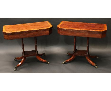 A pair of Regency mahogany canted rectangular card tables, each crossbanded folding top enclosing an inset baize lined playin