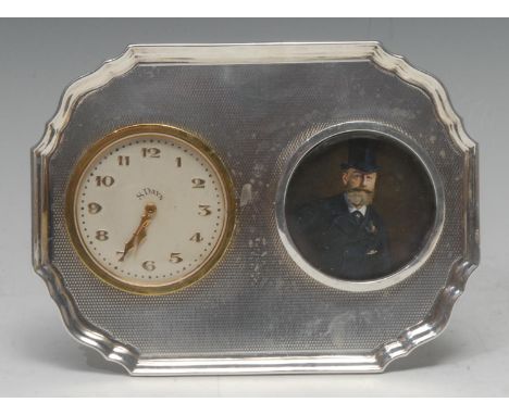 A George V combination shaped rectangular easel timepiece/photograph frame, circular apertures, the clock with Arabic numeral
