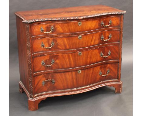 A George III style mahogany serpentine chest, of small proportions, crossbanded gadrooned top above four long graduated cockb