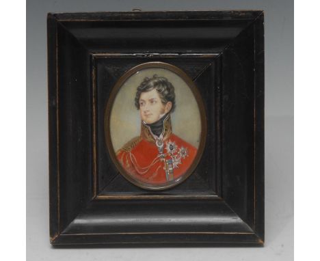 After Sir Thomas Lawrence, a portrait miniature of George IV, bust-length, oval, indistinctly signed Bron*, watercolour on iv