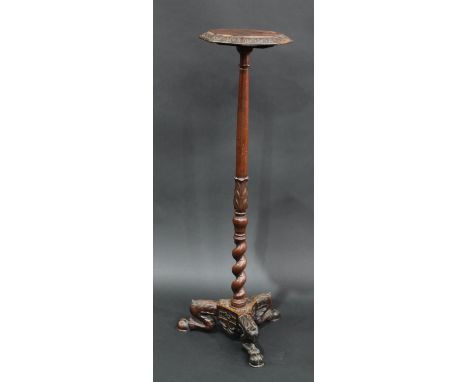 A 19th century mahogany statuary pedestal, octagonal top carved with a border of acanthus, spirally turned and acanthus grasp