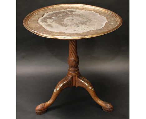 A George III mahogany tripod supper table, later embellished with the addition of a silver plated top, the dished plateau par