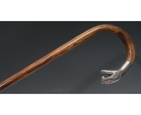 A 19th century walking stick, the handle with silver snake's head, 86cm long, c.1890