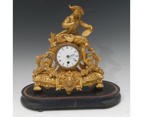 A 19th century French gilt metal mantel clock, the white enamelled dial with Roman numerals, single winding hole, drum case s
