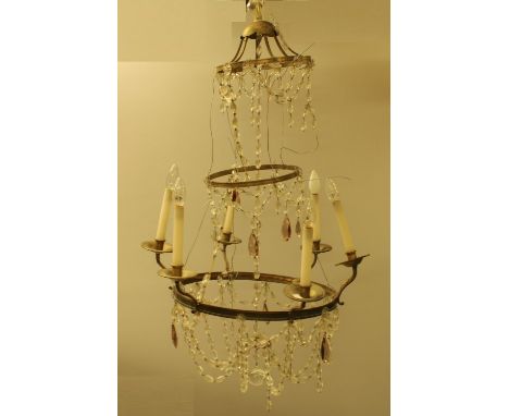 A French three tier ceiling light, the lower frame with six lights, prismatic bead swags, 49cm diam