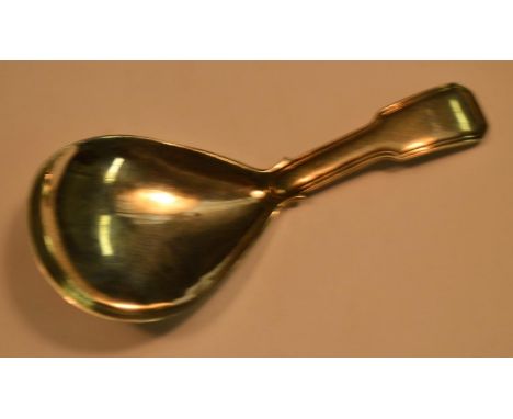 A George III silver caddy spoon, canted rectangular terminal, reeded border, 8.5cm long, Joseph Willmore, Birmingham 1816