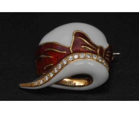 A diamond encrusted red and white enamelled ribbon bow hat brooch, white body with central red tied ribbon bow collar, above 