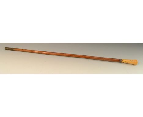 An early 18th century gentleman's ivory and malacca walking stick, of slender proportions, turned tapering handle, contempora