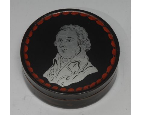 Royalty - an unusual armorial verre églomisé and papier-mâché circular table-top snuff box, the cover inset with a foil portr