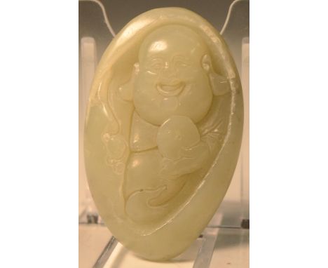 A jade carving, of a Budha, 5cm high