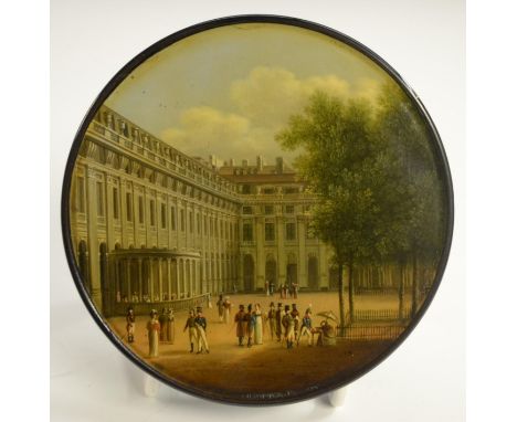 An early 19th century German Named-View papier-mâché circular table-top snuff box, by Stobwasser of Braunschweig, of the Pala