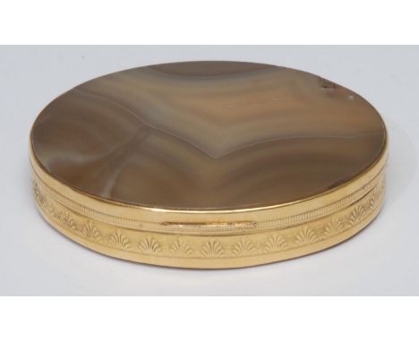 A 19th century oval agate inset gilt metal snuff box, multi tone fortification and banded agate top and base, embossed gilt m