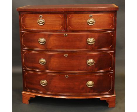 A Victorian mahogany bow front chest, satinwood crossbanded top above two short and three long graduated cockbeaded drawers, 