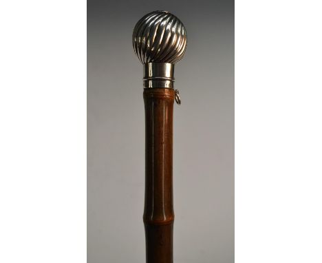 A late Victorian Patent novelty silver 'gadget' system cane, retailed by Brigg of London, stamped, the globular wrythen handl