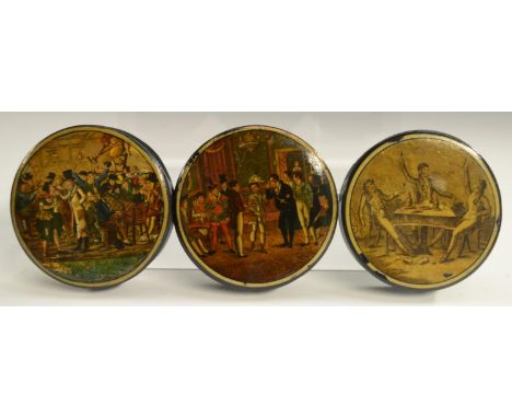 An early 19th century French papier-mâché circular table-top snuff box, the cover printed in monochrome with Epicurean rakes 