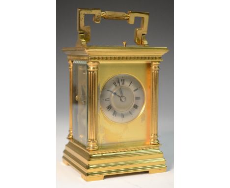 A 19th century repeater carriage clock, with Roman numerals, silvered chapter ring, fluted column to angles, stepped base, an