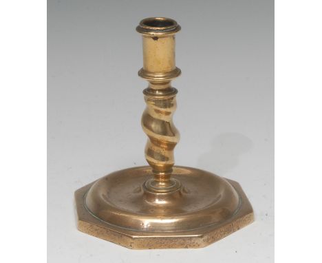 A Continental brass squat candlestick, spirally twisted pillar, dished octagonal base, 14cm high