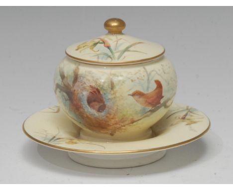 A Royal Worcester ink pot and cover,  painted with a bird perched on branches, on a pale yellow ground date, crown and circle