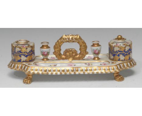 A Chamberlain Worcester standish, with two wells, pen apertures and spill vases, gilt leaf wrapped handle, the tray painted w