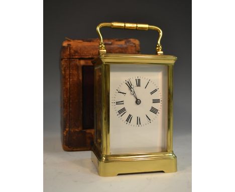A 19th century repeater carriage clock, with Roman numerals, bevelled glass panels, swing handle, 19.5cm high over handles, m