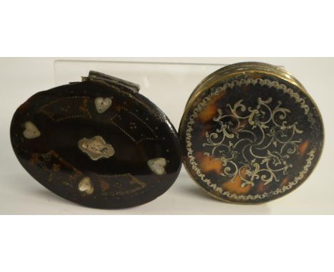 A Queen Anne/George I tortoiseshell oval snuff box, the hinged cover mounted with love hearts and centred by a quatrefoil, pi