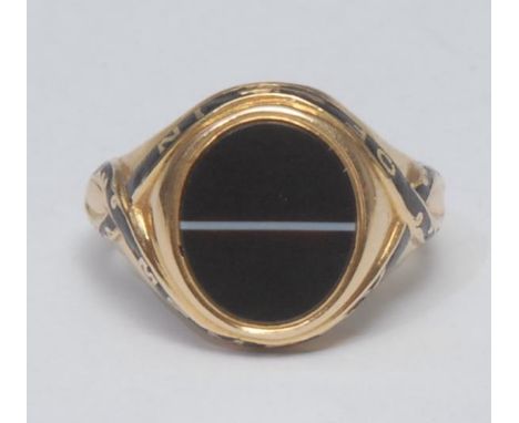 A Victorian 18ct gold and banded onyx mourning ring, the oval stone centred by a singular horizontal band, its black enamel r