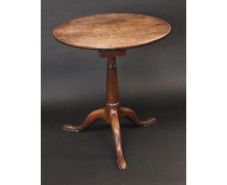 A George III elm tripod occasional table, circular top, turned tapered column, cabriole legs, pad feet, 72.5cm high, 63cm dia