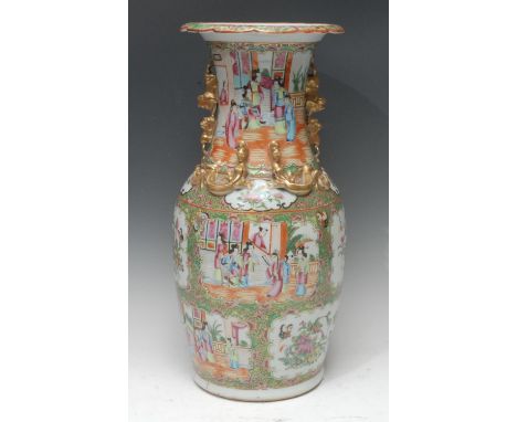 A Chinese famille verte baluster vase, typically painted in polychrome enamels with traditional Court and domestic figures in