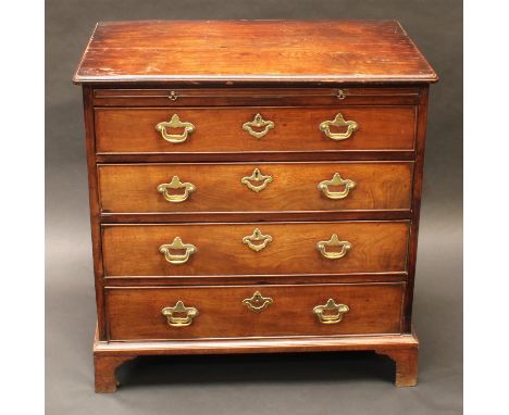A George II mahogany bachelor's chest, moulded rounded rectangular top above a slide and four long graduated cockbeaded drawe